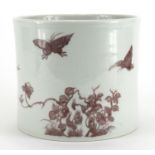 Chinese porcelain cylindrical brush pot, hand painted in iron red with butterflies amongst