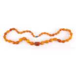 Butterscotch amber coloured bead necklace, 56cm in length, approximate weight 31.5g :For Further