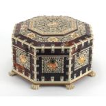 19th century Vizagapatam ivory and tortoiseshell octagonal dressing table box, with applied engraved