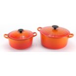 Two Le Creuset lidded casserole dishes, the largest 31cm wide : For Further Condition Reports Please