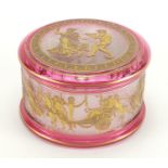 Cranberry glass pot and cover in the style of Moser, etched and gilded with classical figures, 7.5cm