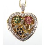 Chinese silver gilt locket set with ruby's. emeralds and diamonds on a silver gilt necklace, the