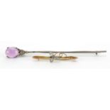 9ct gold blue stone bar brooch and a Scottish white metal bar brooch set with a cabochon amethyst,