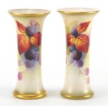 Near pair of Royal Worcester porcelain vases hand painted with berries and flowers by Kitty Blake,