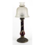 Ruby red and gilt brass mounted table lamp, with etched glass shade and Palmer & Co Patent spring