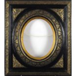 Carved black and gilt painted frame, with oval aperture, overall 54cm x 47.5cm :For Further