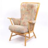 Ercol light elm Evergreen stick back armchair, with floral button back upholstery, 102cm high :