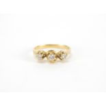18ct gold diamond three stone ring, size N, approximate weight 4.0g :For Further Condition Reports
