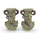 Pair of Palissy Majolica vases with twin handles, decorated with snakes, toads and lizards, each