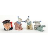 Three Nao clowns and a Royal Doulton Postman Toby jug, the largest 13cm high : For Further Condition