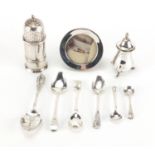 Silver items comprising two casters, miniature circular photo frame and six spoons, various