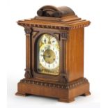 Oak cased Westminster chiming mantel clock by Junghans, with silvered chapter ring and Arabic