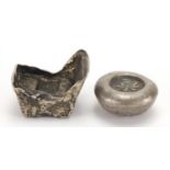 Two Chinese silver coloured metal trade tokens, with impressed character marks, the largest 3cm