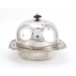 Silver muffin dish with dome cover, retailed by Aprey, London 1932, 14cm high x 18cm wide,