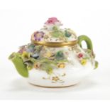 19th century Meissen floral encrusted porcelain miniature teapot, hand painted and gilded, cross