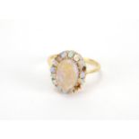 Unmarked gold cabochon opal cluster ring, size L, approximate weight 3.0g :For Further Condition