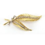 18ct two tone gold and diamond fern brooch, RHB makers mark, 6cm in length, approximate weight 12.2g
