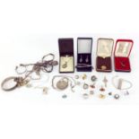 Silver and white metal jewellery including Ingot, pendants on necklaces, bracelets and earrings,