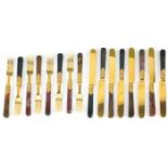 Set of eight Scottish agate handled knives and forks, with gilt silver plated blades, the knives