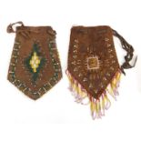 Two Native American leather and beadwork purses, one with drops, each approximately 28cm x 20cm :For