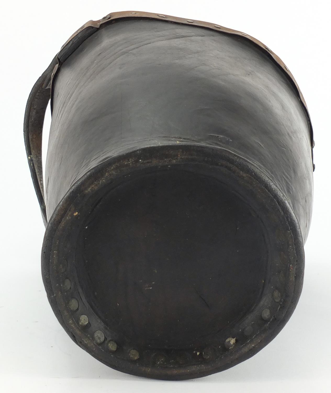 Antique metal studded leather fire bucket, 31cm high excluding the handle :For Further Condition - Image 4 of 4