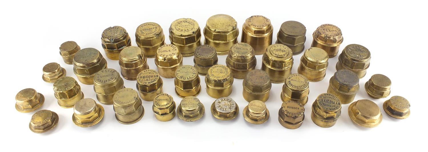 19th century brass hub nuts including F Daines, B Barnaby, J Pullan and J Hardman & Sons, the