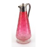 Victorian cranberry glass claret jug with silver plated mounts, etched in relief with butterflies
