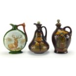 Three Royal Doulton Dewar's Whisky decanters, two Kingsware examples, Ben Jonson and The Watchman,
