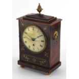 Regency mahogany bracket clock, with brass foliate inlay, ring turned handles and pineapple