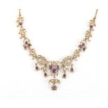 9ct gold amethyst and seed pearl necklace with insect motif, housed in a Victorian tooled leather