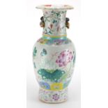 Large Chinese porcelain baluster vase with twin naturalistic handles, hand painted in the famille
