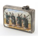 Edwardian silver and enamel vesta by S Mordan & Co, depicting Scotsmen playing bagpipes,