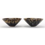 Pair of Chinese pottery bowls, each having a russet splashed black glaze, each 16cm in diameter :For