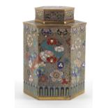 Japanese cloisonne hexagonal tea caddy, enamelled with roundels of stylised flowers, 11cm high :