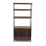 Madagascar ebony room divider, fitted with three galleried shelves above a pair of cupboard doors,