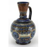Doulton Lambeth stoneware jug, hand painted and incised with flower heads, impressed factory marks