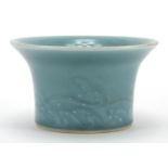 Chinese porcelain blue glazed bowl with fluted rim, incised with a continuous band of crashing