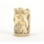 19th century Japanese ivory Netsuke carved with a dragon, snake and animals, character marks to
