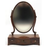 Georgian oval toilet mirror, the serpentine fronted base with three drawers, 60cm high : For Further