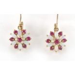 Pair of 9ct gold opal and garnet flower head earrings, 2.8cm in length, approximate weight 2.2g :For