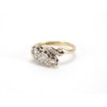 9ct gold diamond crossover ring, size M, approximate weight 3.0g : For Further Condition Reports
