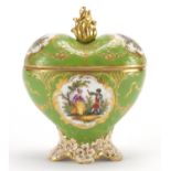 Dresden trinket box and cover of love heart form, hand painted with panels of lovers within gilt