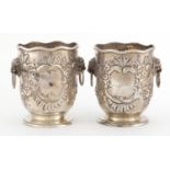 Pair of Victorian silver miniature ice buckets, embossed with flowers and lion mask ring handles, by