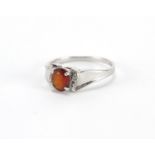 9ct white gold orange stone ring size N, approximate weight 2.4g : For Further Condition Reports