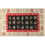 Rectangular Bessarabian Kilim rug, having an all over stylised floral design, approximately 180cm