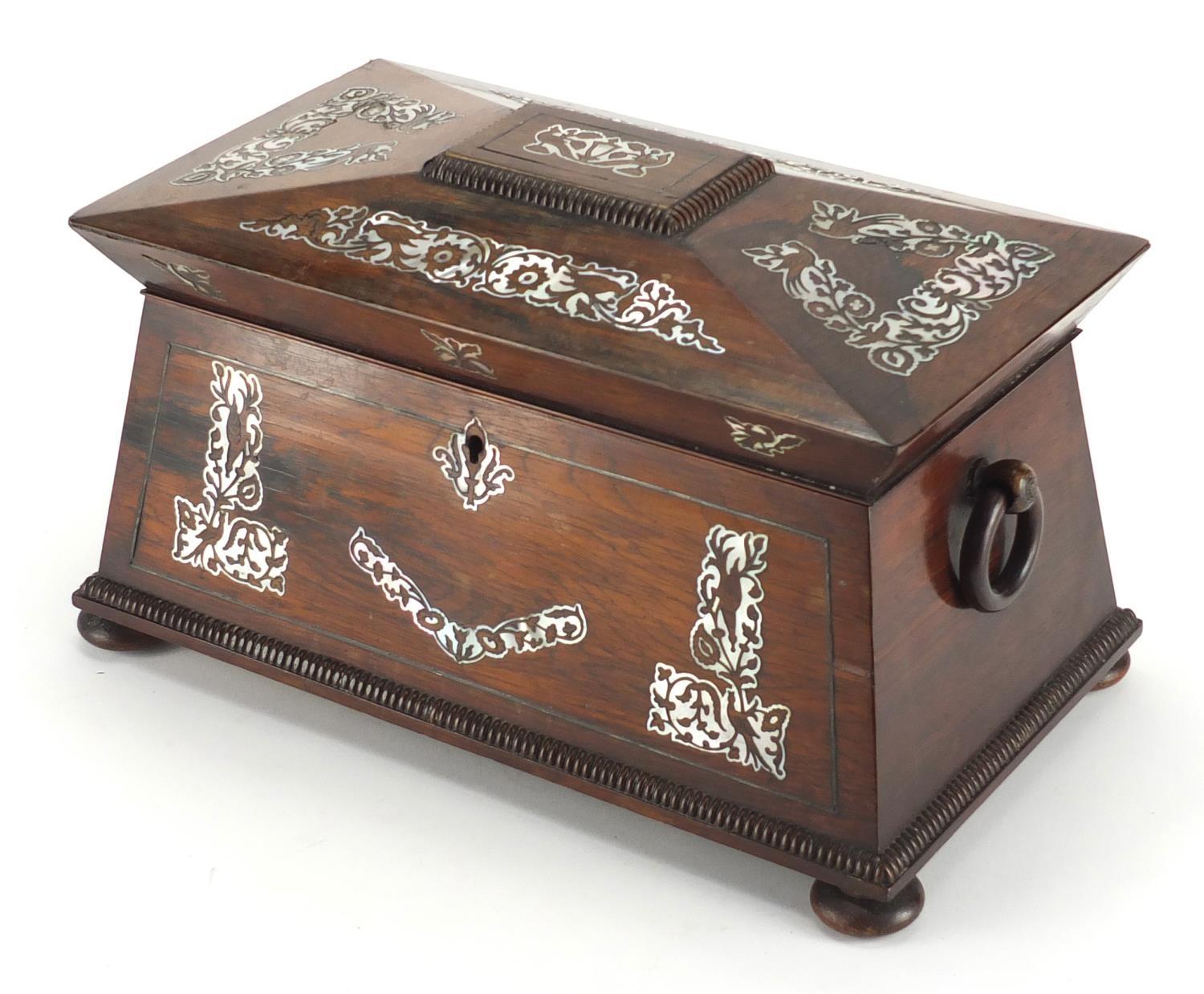 Victorian rosewood sarcophagus tea caddy, with Mother of pearl inlay, ring turned handles and fitted