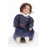 19th century French bisque headed doll by Societe de Fabrication des Bébés et Jouets, with open