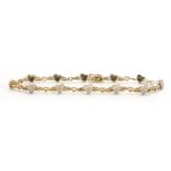 9ct gold diamond love heart bracelet, 20cm in length, approximate weight 6.9g : For Further