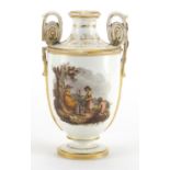 19th century twin handled gilded porcelain vase, hand painted with pastoral scenes, 18cm high :For