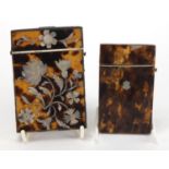 Two Victorian blonde tortoiseshell calling card cases, one with Mother of Pearl inlay decorated with